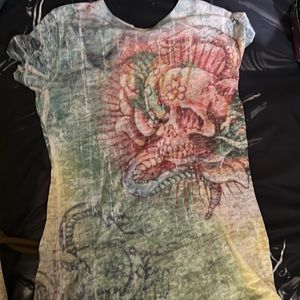 Sinful brand. Very cool shirt